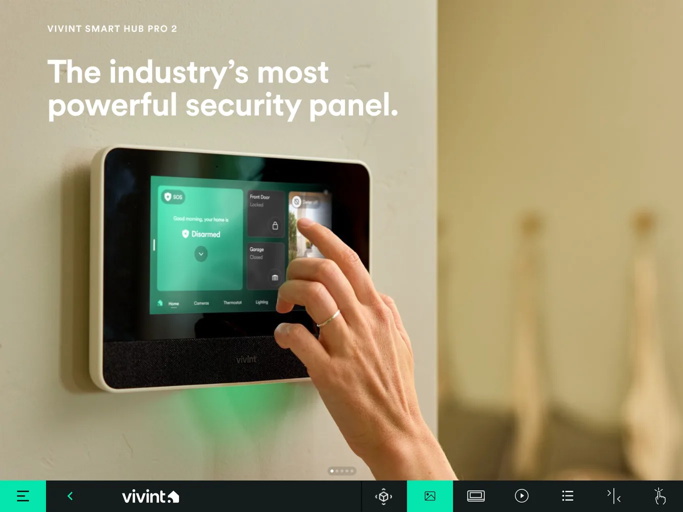 Smart Hub Pro 2 slide: a hand tapping the panel on a wall, headed "The industry's most powerful security panel."